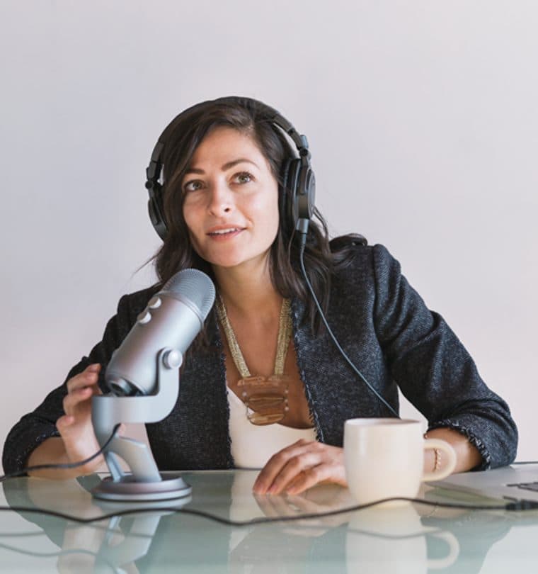 Podcast hosts recording an interview
